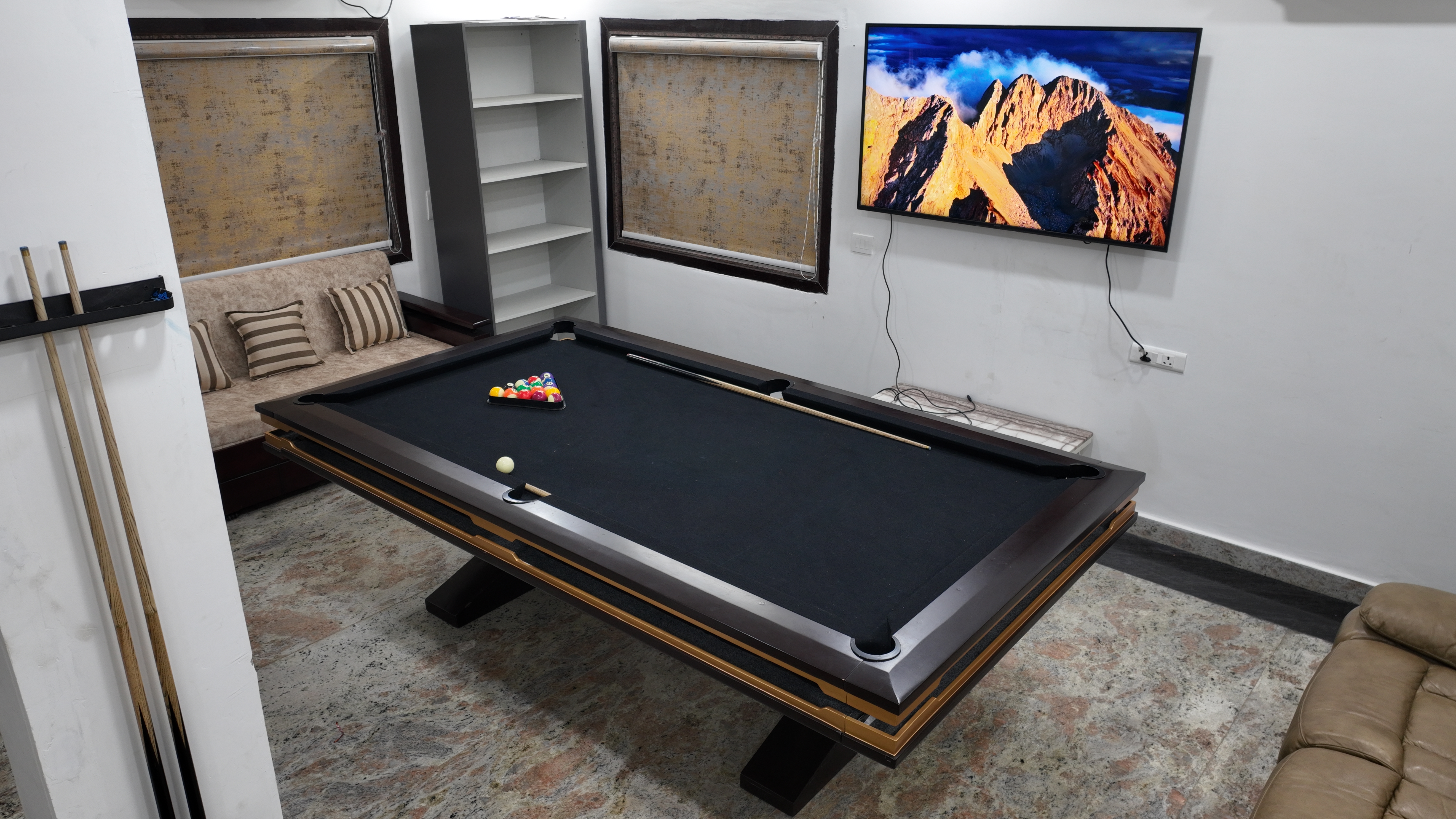 Premium indoor recreation lounge with professional billiards table
